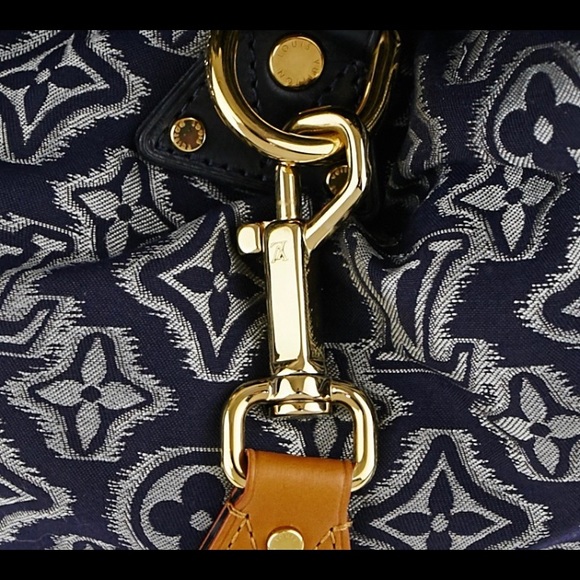 LOUIS VUITTON
Limited Edition Navy Jacquard Monogram Fabric Aviator Bag - Picture 2 of 10